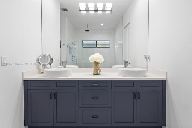 4381 SW 178th Ave, Miramar, FL 33029 - bathroom featuring a marble finish shower and double vanity