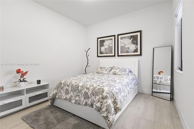 4381 SW 178th Ave, Miramar, FL 33029 - bedroom with light wood-type flooring and baseboards