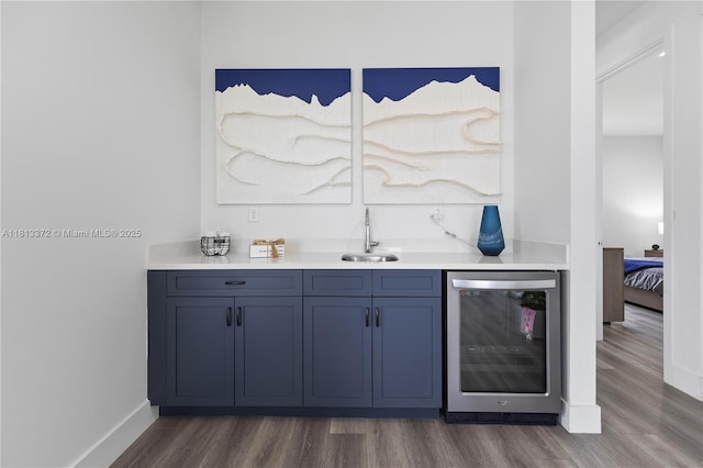 4381 SW 178th Ave, Miramar, FL 33029 - indoor wet bar featuring wine cooler, dark wood-style floors, and baseboards