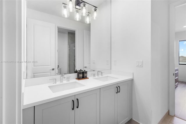 4381 SW 178th Ave, Miramar, FL 33029 - full bath featuring double vanity, an enclosed shower, baseboards, and tile patterned floors