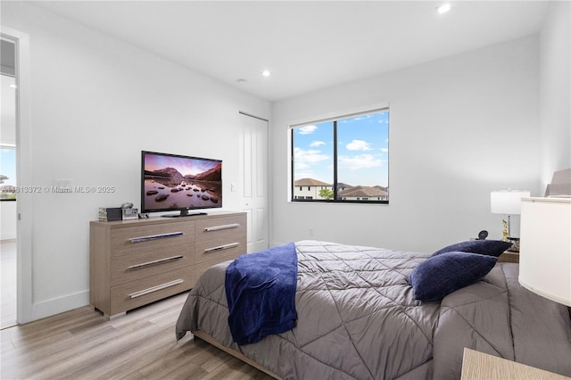 4381 SW 178th Ave, Miramar, FL 33029 - bedroom featuring light wood-style floors, recessed lighting, and baseboards