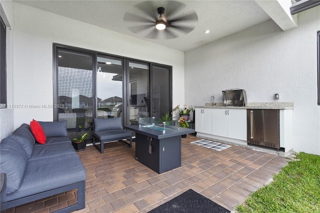 4381 SW 178th Ave, Miramar, FL 33029 - view of patio / terrace featuring an outdoor fire pit, area for grilling, a ceiling fan, and a sink