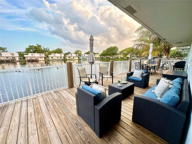1370 NE 40th Dr, Oakland Park, FL 33334 - wooden deck with an outdoor hangout area and a water view