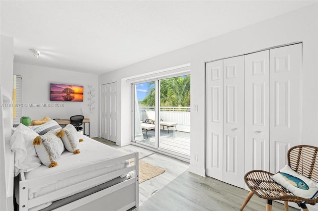 1370 NE 40th Dr, Oakland Park, FL 33334 - bedroom featuring access to outside, light wood finished floors, and a closet