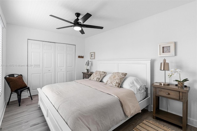 1370 NE 40th Dr, Oakland Park, FL 33334 - bedroom featuring wood finished floors, a closet, and a ceiling fan