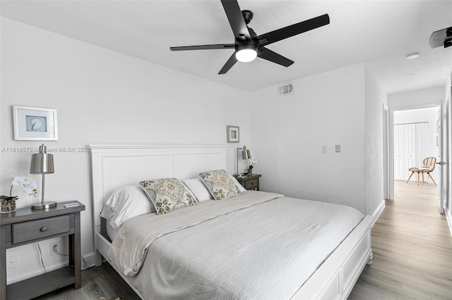 1370 NE 40th Dr, Oakland Park, FL 33334 - bedroom featuring wood finished floors and ceiling fan