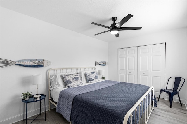 1370 NE 40th Dr, Oakland Park, FL 33334 - bedroom featuring wood finished floors, ceiling fan, and a closet