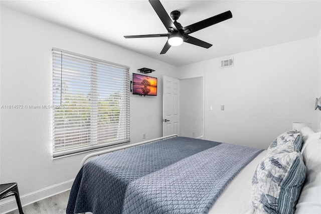1370 NE 40th Dr, Oakland Park, FL 33334 - bedroom featuring wood finished floors and a ceiling fan