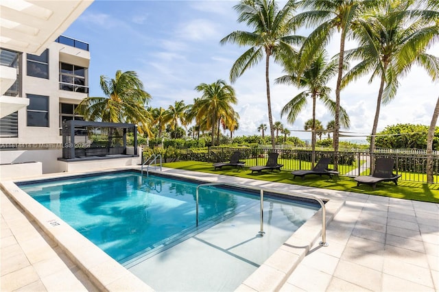 5845 Collins Ave Unit 501, Miami Beach, FL 33140 - community pool featuring a patio area