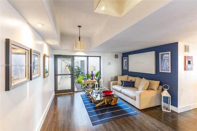 5845 Collins Ave Unit 501, Miami Beach, FL 33140 - living room with baseboards and dark wood finished floors