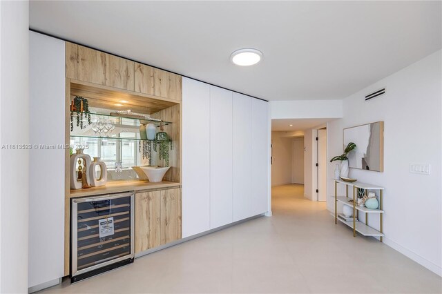 6301 Collins Ave Unit 1405, Miami Beach, FL 33141 - indoor wet bar featuring beverage cooler