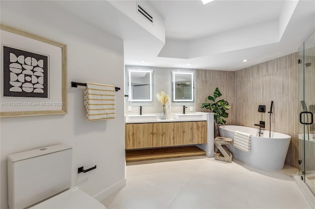 6301 Collins Ave Unit 1405, Miami Beach, FL 33141 - bathroom with a freestanding bath, double vanity, a stall shower, and recessed lighting
