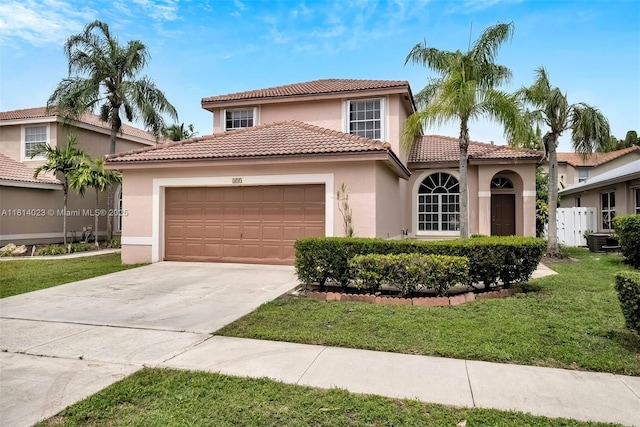 495 SW 183rd Way, Pembroke Pines, FL 33029 - mediterranean / spanish-style house featuring a garage, stucco siding, a front lawn, concrete driveway, and a tile roof