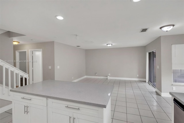 495 SW 183rd Way, Pembroke Pines, FL 33029 - kitchen with light tile patterned floors, white cabinetry, baseboards, light countertops, and recessed lighting