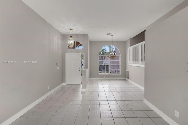 495 SW 183rd Way, Pembroke Pines, FL 33029 - entryway featuring a chandelier, light tile patterned floors, and baseboards