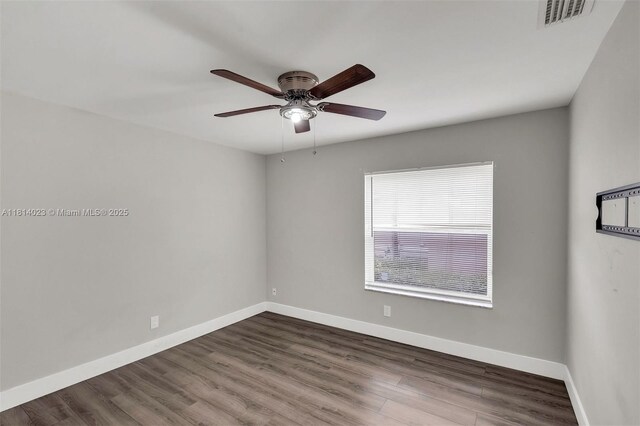 495 SW 183rd Way, Pembroke Pines, FL 33029 - unfurnished room with baseboards, a ceiling fan, and dark wood-style flooring
