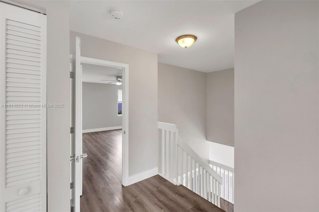 495 SW 183rd Way, Pembroke Pines, FL 33029 - hall featuring an upstairs landing, wood finished floors, and baseboards