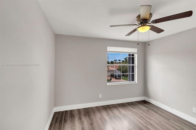 495 SW 183rd Way, Pembroke Pines, FL 33029 - unfurnished room featuring wood finished floors, baseboards, and ceiling fan
