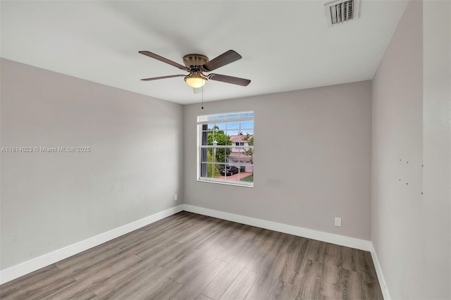 495 SW 183rd Way, Pembroke Pines, FL 33029 - empty room featuring a ceiling fan, wood finished floors, and baseboards