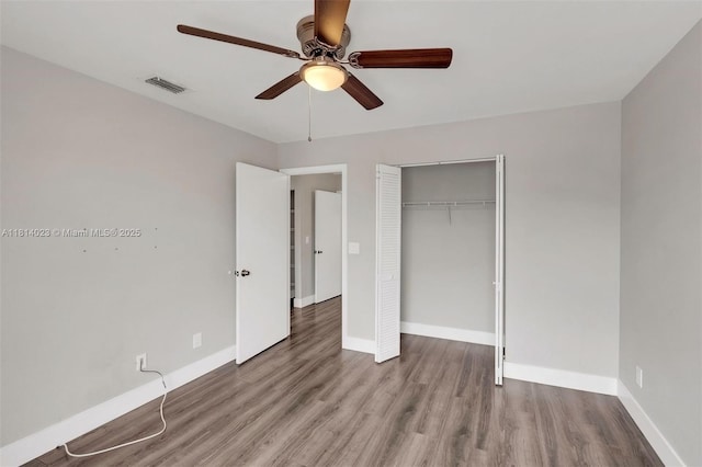 495 SW 183rd Way, Pembroke Pines, FL 33029 - unfurnished bedroom featuring wood finished floors, a closet, baseboards, and ceiling fan