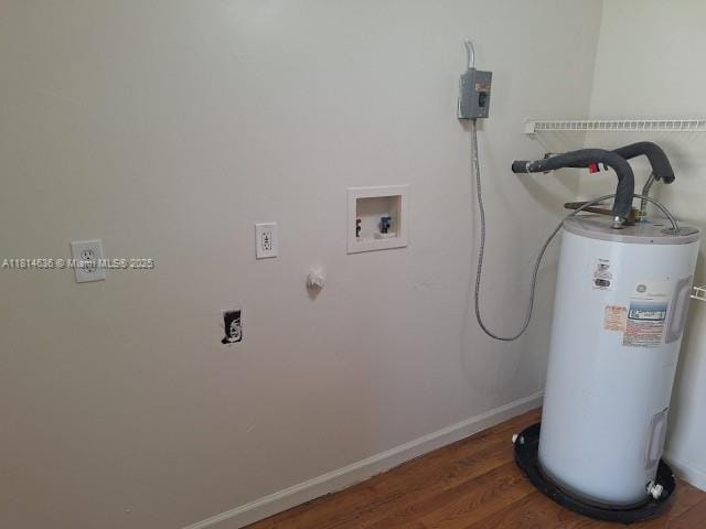 3961 Park Ln, Palm Springs, FL 33406 - laundry room with water heater, hookup for a washing machine, and wood finished floors