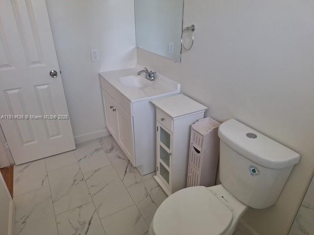 3961 Park Ln, Palm Springs, FL 33406 - bathroom with marble look tile flooring and vanity
