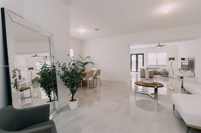 17451 SW 41st St, Miramar, FL 33029 - living area with a ceiling fan, baseboards, and light tile patterned flooring