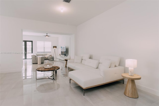 17451 SW 41st St, Miramar, FL 33029 - tiled living area with baseboards and a ceiling fan