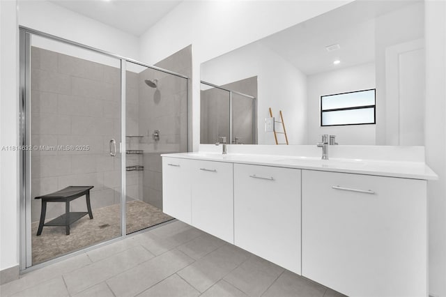 17451 SW 41st St, Miramar, FL 33029 - bathroom featuring double vanity, a stall shower, recessed lighting, and tile patterned flooring