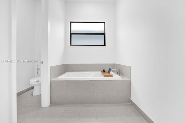 17451 SW 41st St, Miramar, FL 33029 - full bath with toilet, a garden tub, tile patterned floors, and baseboards