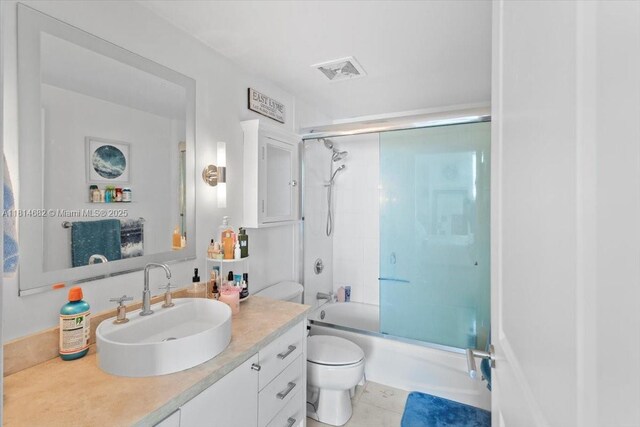 1250 S Miami Ave Unit 2208, Miami, FL 33130 - full bath featuring toilet, vanity, bath / shower combo with glass door, and tile patterned flooring