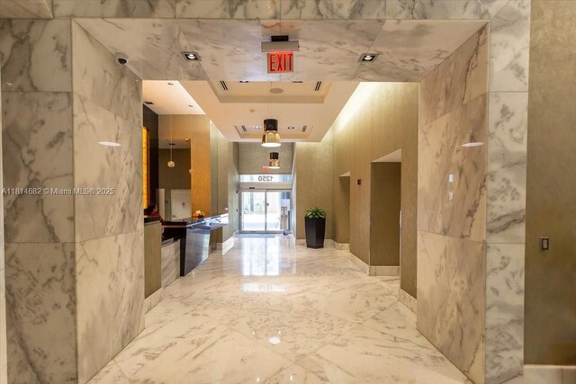1250 S Miami Ave Unit 2208, Miami, FL 33130 - hall with marble tiled floors