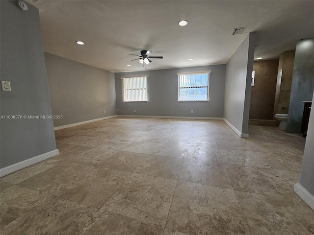 4131 NW 79th Ave Unit 4131, Sunrise, FL 33351 - unfurnished room featuring a ceiling fan, baseboards, recessed lighting, and a smoke detector