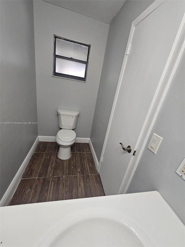 4131 NW 79th Ave Unit 4131, Sunrise, FL 33351 - bathroom with toilet and baseboards