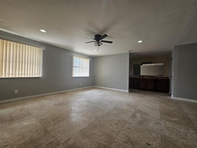 4131 NW 79th Ave Unit 4131, Sunrise, FL 33351 - unfurnished living room with baseboards, ceiling fan, and recessed lighting