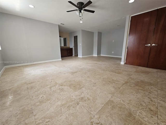 4131 NW 79th Ave Unit 4131, Sunrise, FL 33351 - unfurnished living room with ceiling fan, baseboards, and recessed lighting