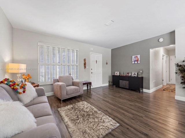 9200 SW 178th Ter, Palmetto Bay, FL 33157 - living area with dark wood-style floors and baseboards