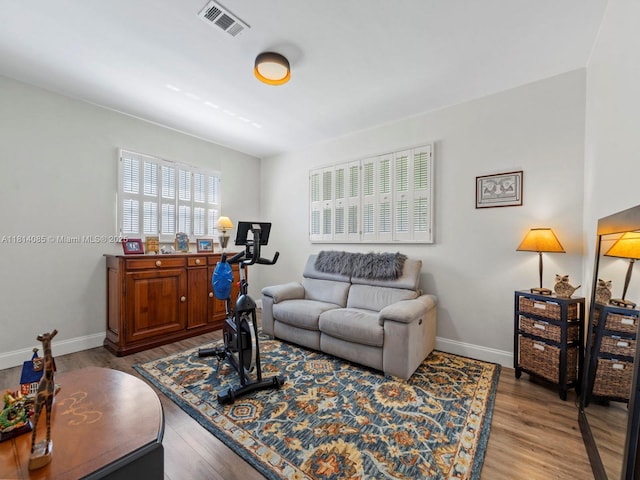 9200 SW 178th Ter, Palmetto Bay, FL 33157 - living area featuring wood finished floors and baseboards