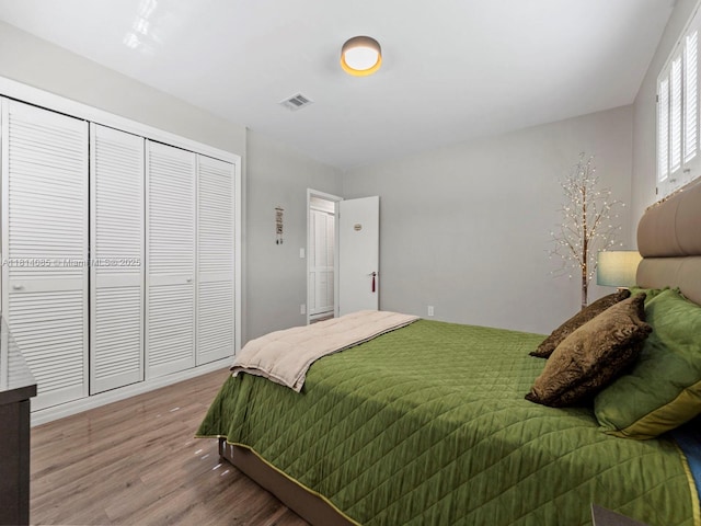 9200 SW 178th Ter, Palmetto Bay, FL 33157 - bedroom with wood finished floors and a closet
