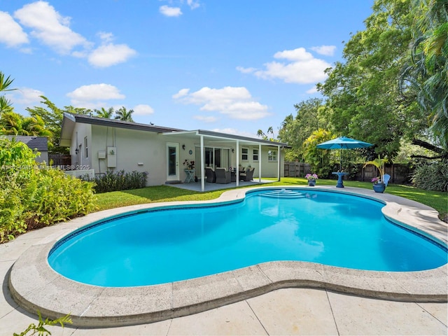 9200 SW 178th Ter, Palmetto Bay, FL 33157 - view of swimming pool featuring an outdoor living space and a patio area