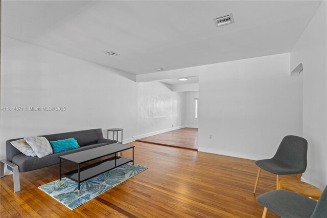 1105 NE 119th St, Biscayne Park, FL 33161 - living area featuring wood finished floors and baseboards