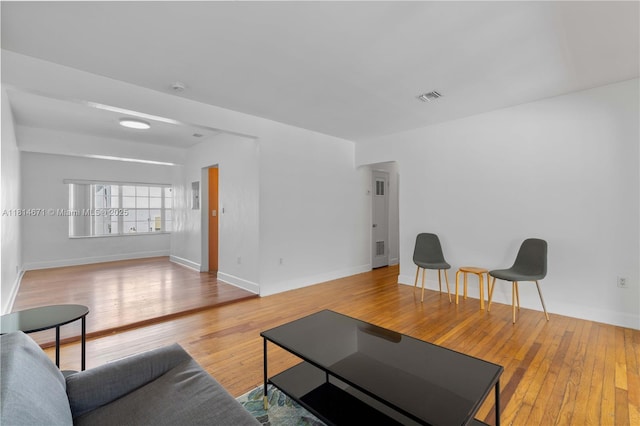 1105 NE 119th St, Biscayne Park, FL 33161 - living area with wood finished floors and baseboards