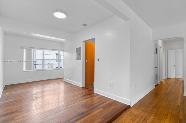 1105 NE 119th St, Biscayne Park, FL 33161 - living room featuring wood-type flooring and baseboards