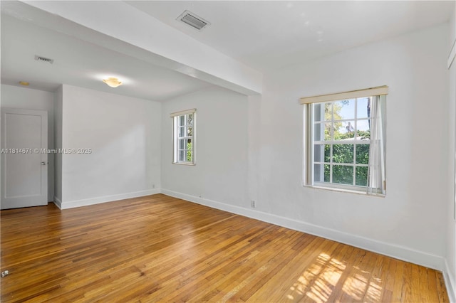1105 NE 119th St, Biscayne Park, FL 33161 - unfurnished room featuring baseboards and light wood-style floors