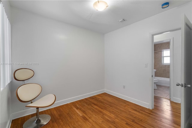 1105 NE 119th St, Biscayne Park, FL 33161 - empty room featuring light wood-style floors
