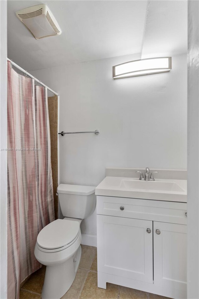 1105 NE 119th St, Biscayne Park, FL 33161 - bathroom featuring vanity, tile patterned floors, and curtained shower