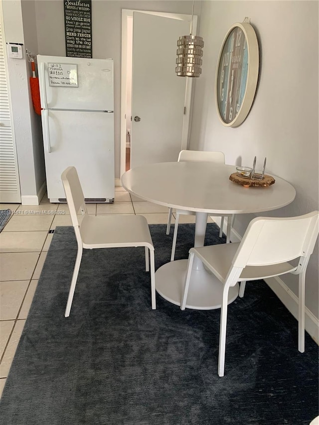 1105 NE 119th St, Biscayne Park, FL 33161 - dining space featuring baseboards and tile patterned floors