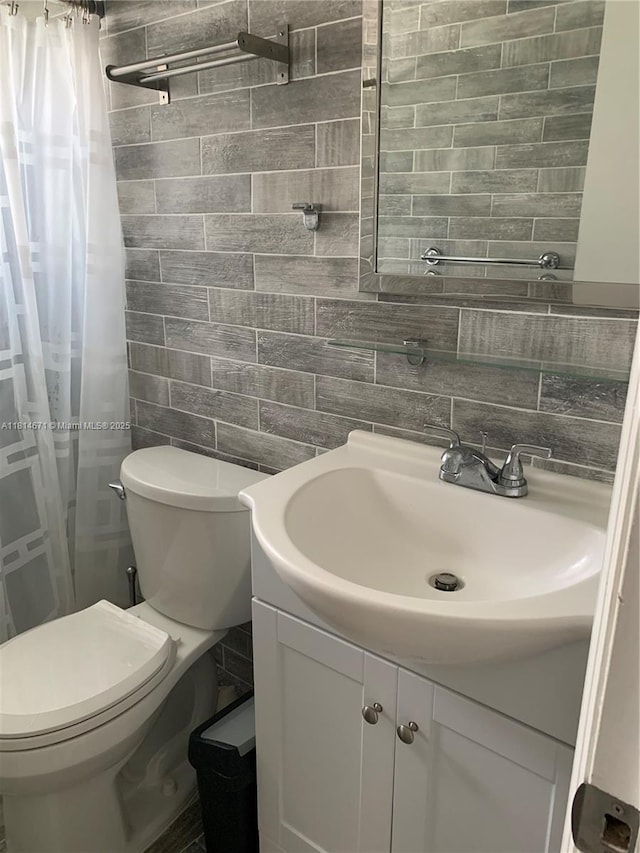 1105 NE 119th St, Biscayne Park, FL 33161 - full bathroom with tile walls, vanity, tasteful backsplash, and curtained shower