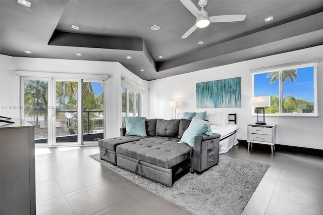 2612 Key Largo Ln, Fort Lauderdale, FL 33312 - living room featuring a raised ceiling, a ceiling fan, recessed lighting, and tile patterned floors