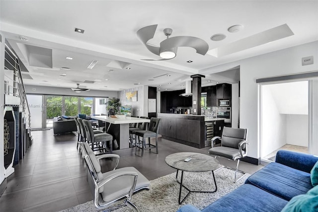 2612 Key Largo Ln, Fort Lauderdale, FL 33312 - living room with recessed lighting, decorative columns, and a ceiling fan